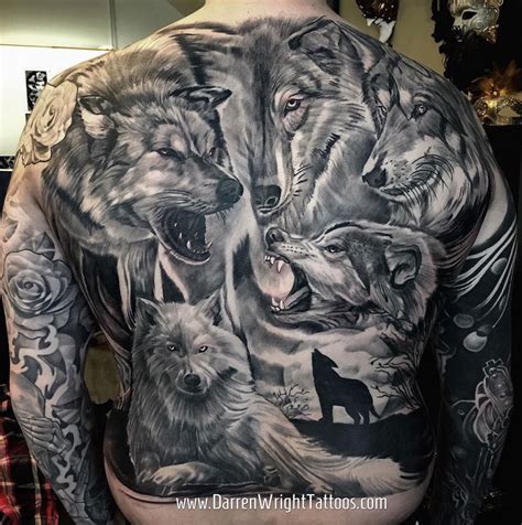 alpha wolf tattoo|wolf back tattoo.